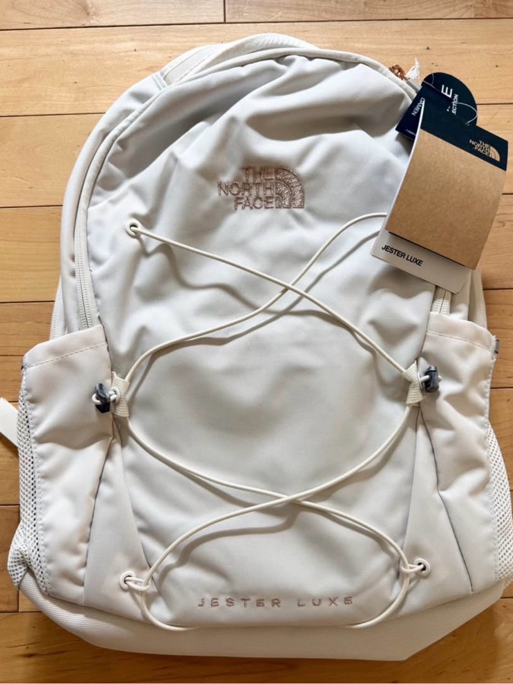 The North Face Jester Luxe Backpack in Cream with Rose Gold Logo